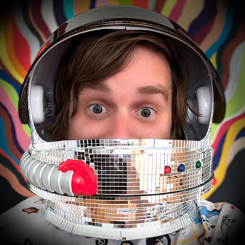 Brad Frost wearing a toy astronaut helmet
